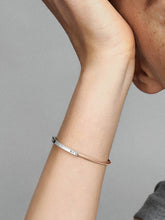 FINAL SALE - Pandora Signature Two-tone I-D Pavé Bangle Sterling silver, 14k rose gold plating