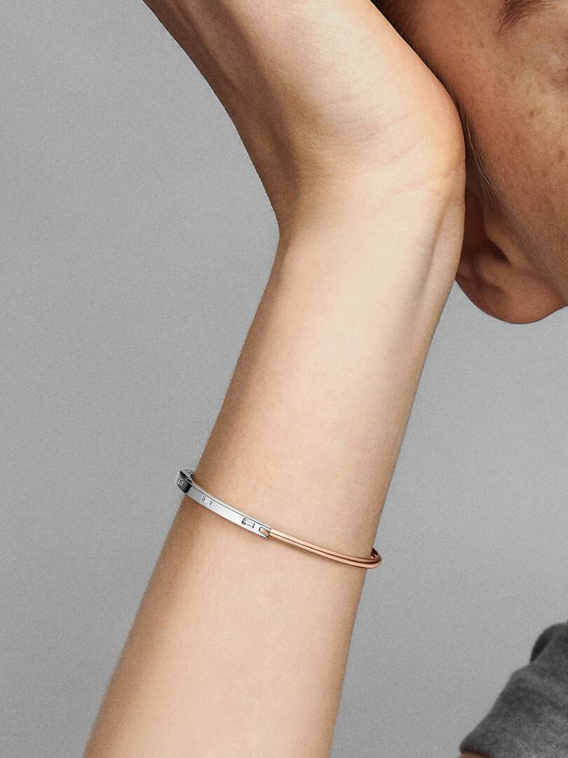 FINAL SALE - Pandora Signature Two-tone I-D Pavé Bangle Sterling silver, 14k rose gold plating